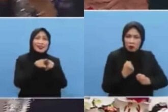 Juru bahasa isyarat.