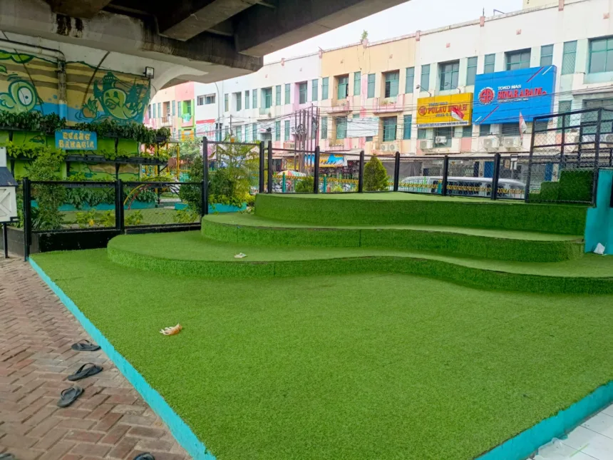 DLH Kota Tangsel Perbaiki Lapangan Futsal dan Taman Baca di Kolong Flyover Ciputat 1 Flyover Ciputat